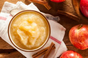 Bowl of unsweetened applesauce for homemade dog treats
