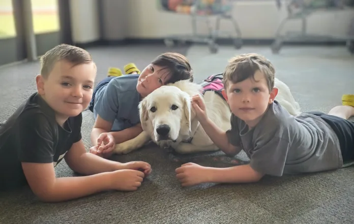 Therapy dog Luna with students at Barnes Elementary School Therapy dog Luna with students at Barnes Elementary School